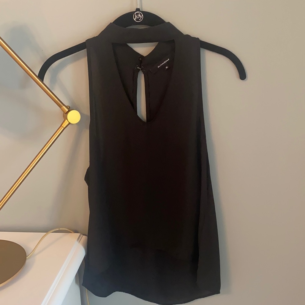 Sheer black (but not see thru) tank top. V cut